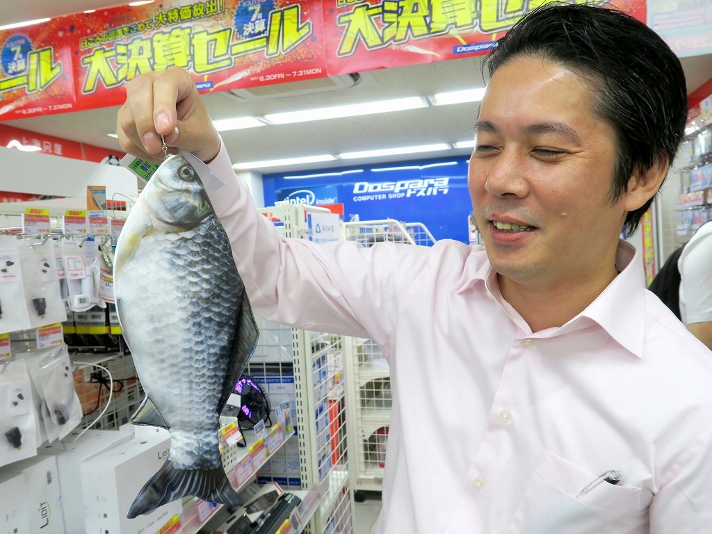 上海問屋 梶間さん